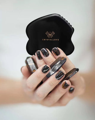 Gua sha kasvohierontalevy, joka on valmistettu obsidiaanikivestä, jolla on suuri voima Crystallove - 2