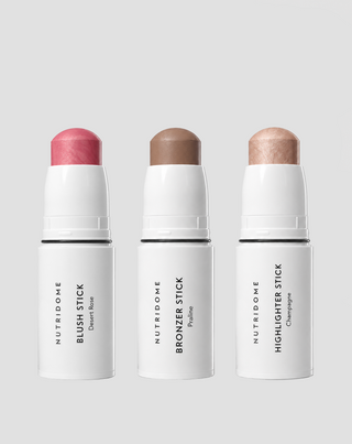 Kasvojen meikki- ja muotoilusetti: aurinkopuuteri, poskipuna ja highlighter puikossa Nutridome