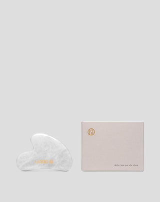 Uddon valkoinen jade kasvohieronta gua sha kivi turvotuksen vähentämiseen ja kiinteyttämiseen.